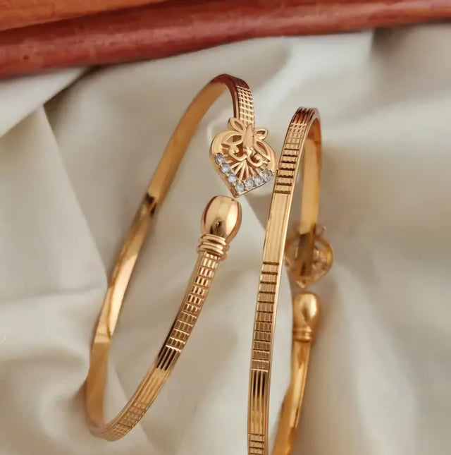 Heart-Shaped Gold Bangles with Diamond Accents – Romantic & Modern Look