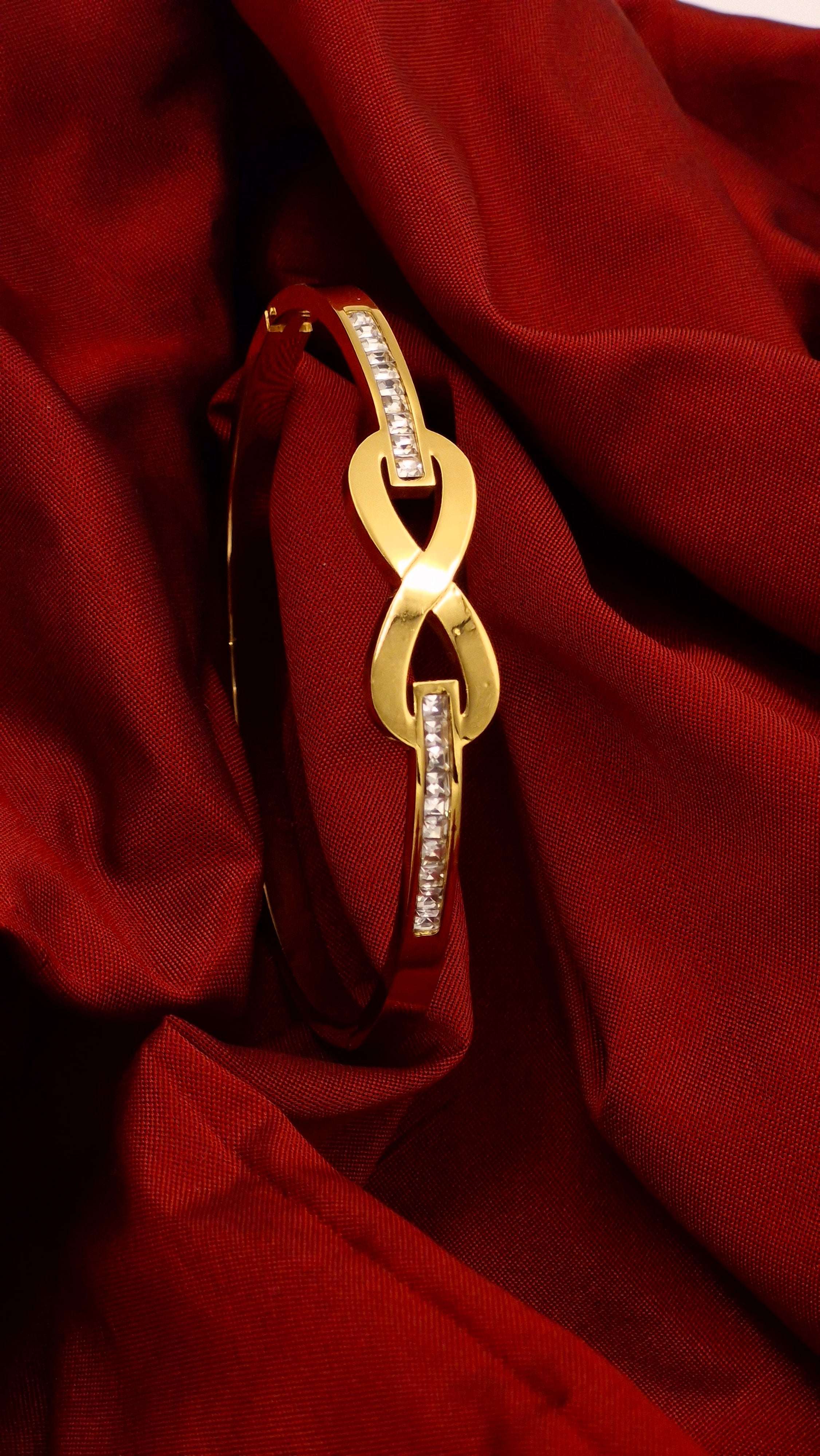 Gold Finish Infinity Design Kada with Stone Detailing – Anti-Tarnish Bracelet for Women