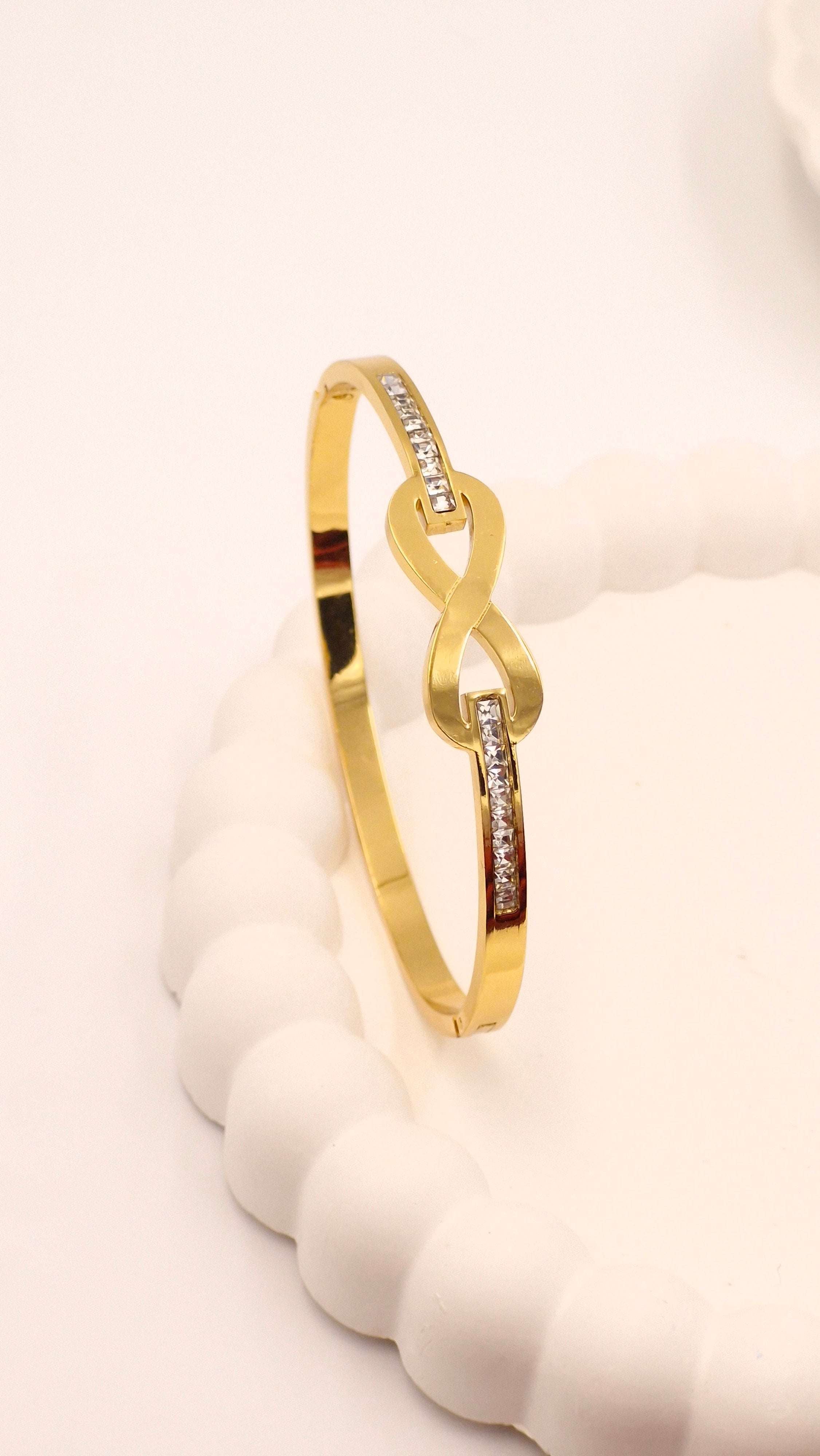 Gold Finish Infinity Design Kada with Stone Detailing – Anti-Tarnish Bracelet for Women