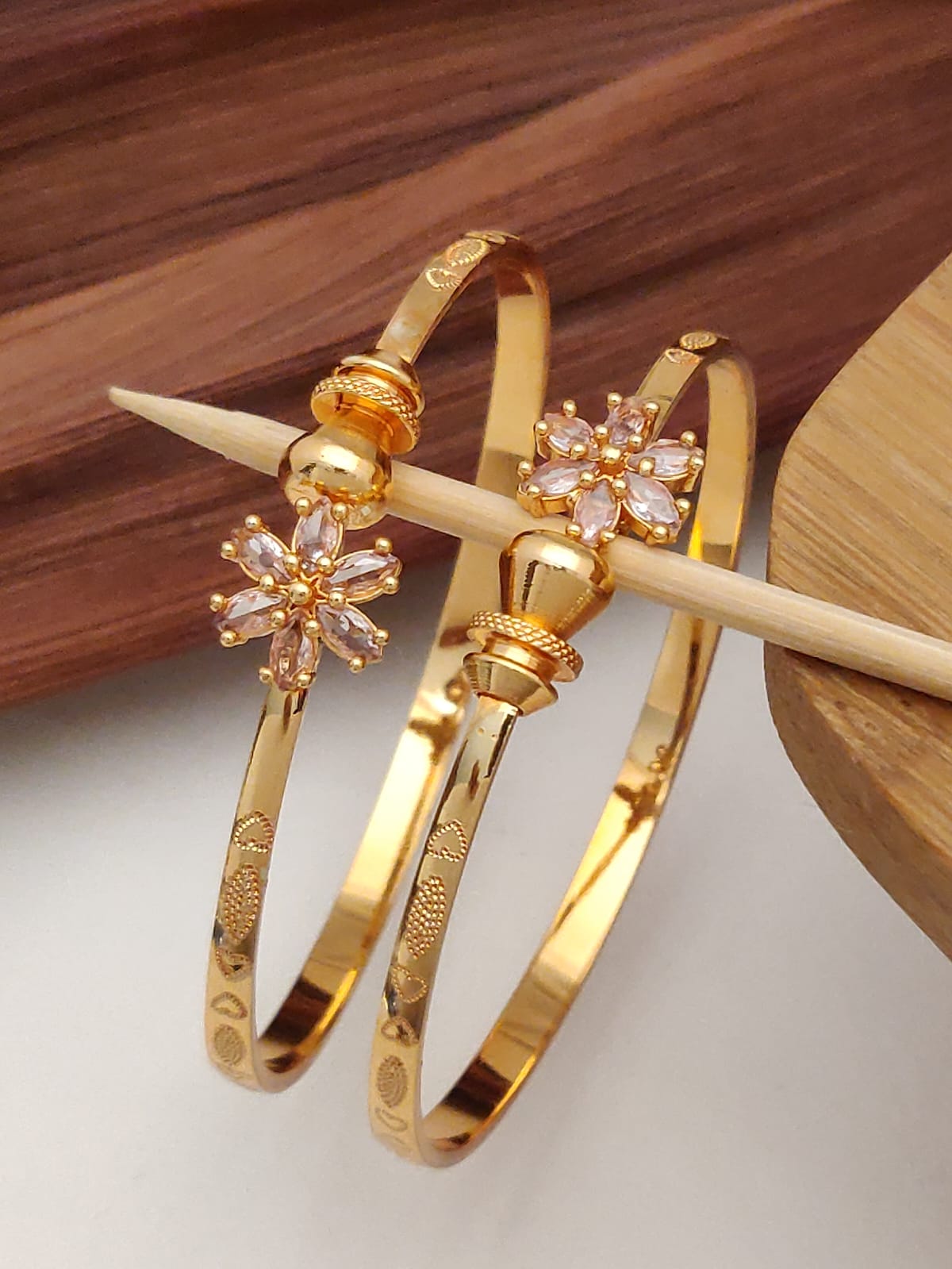 Elegant Floral Gold-Plated Bangles with Light Pink Stones – Festive & Party Wear