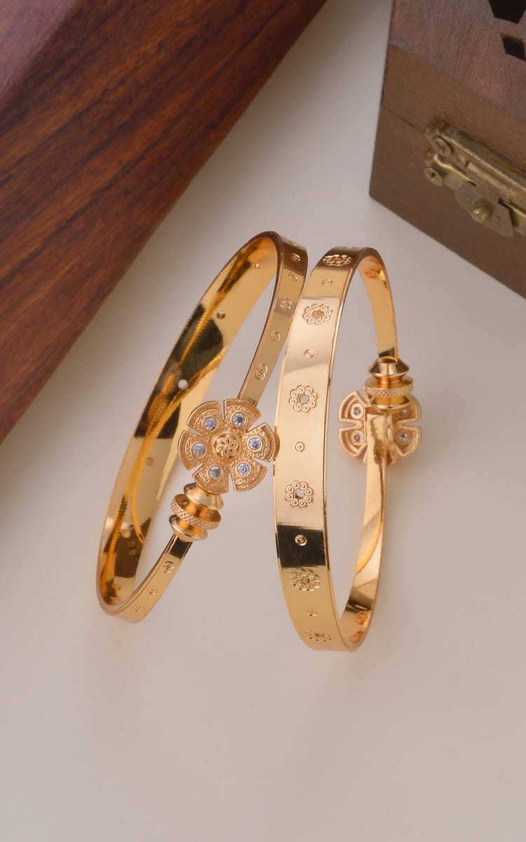 Floral Pattern Gold Bangles with Crystal Accents – Traditional Charm