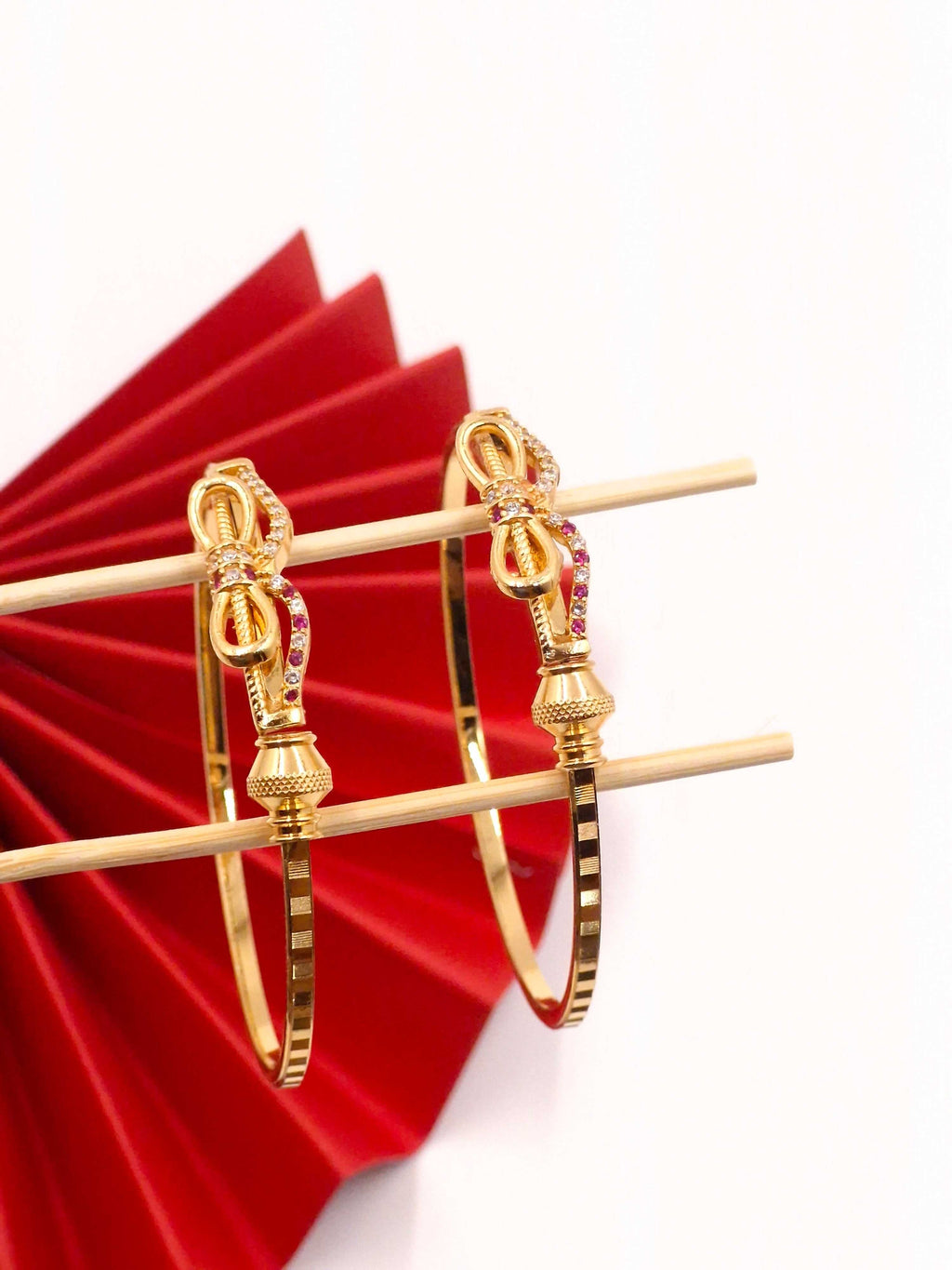 Gold-Plated American Diamond & Ruby Stone Studded Bow-Knot Designer Bangle Set for Women & Girls (Pack of 2)