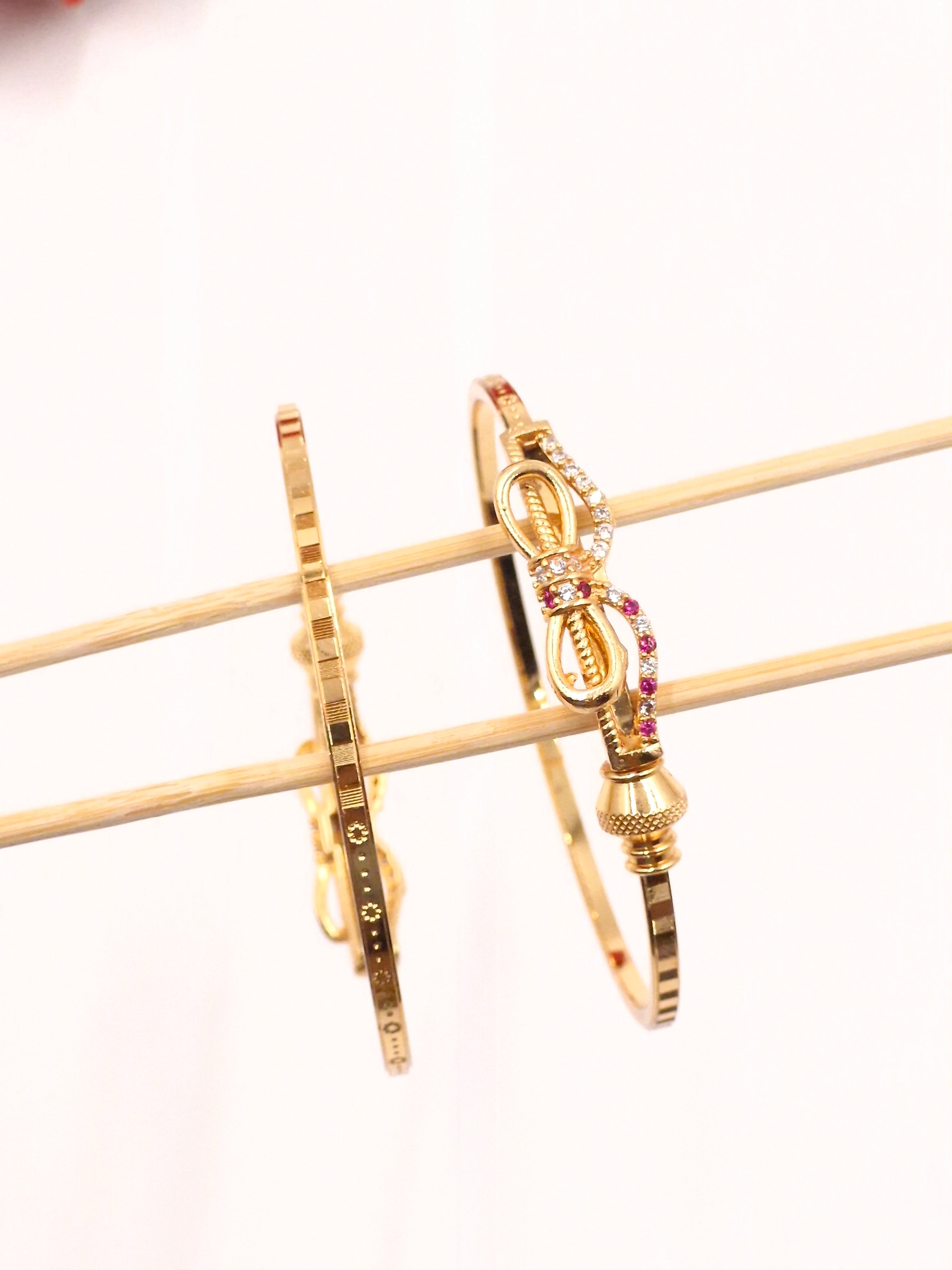 Gold-Plated American Diamond & Ruby Stone Studded Bow-Knot Designer Bangle Set for Women & Girls (Pack of 2)