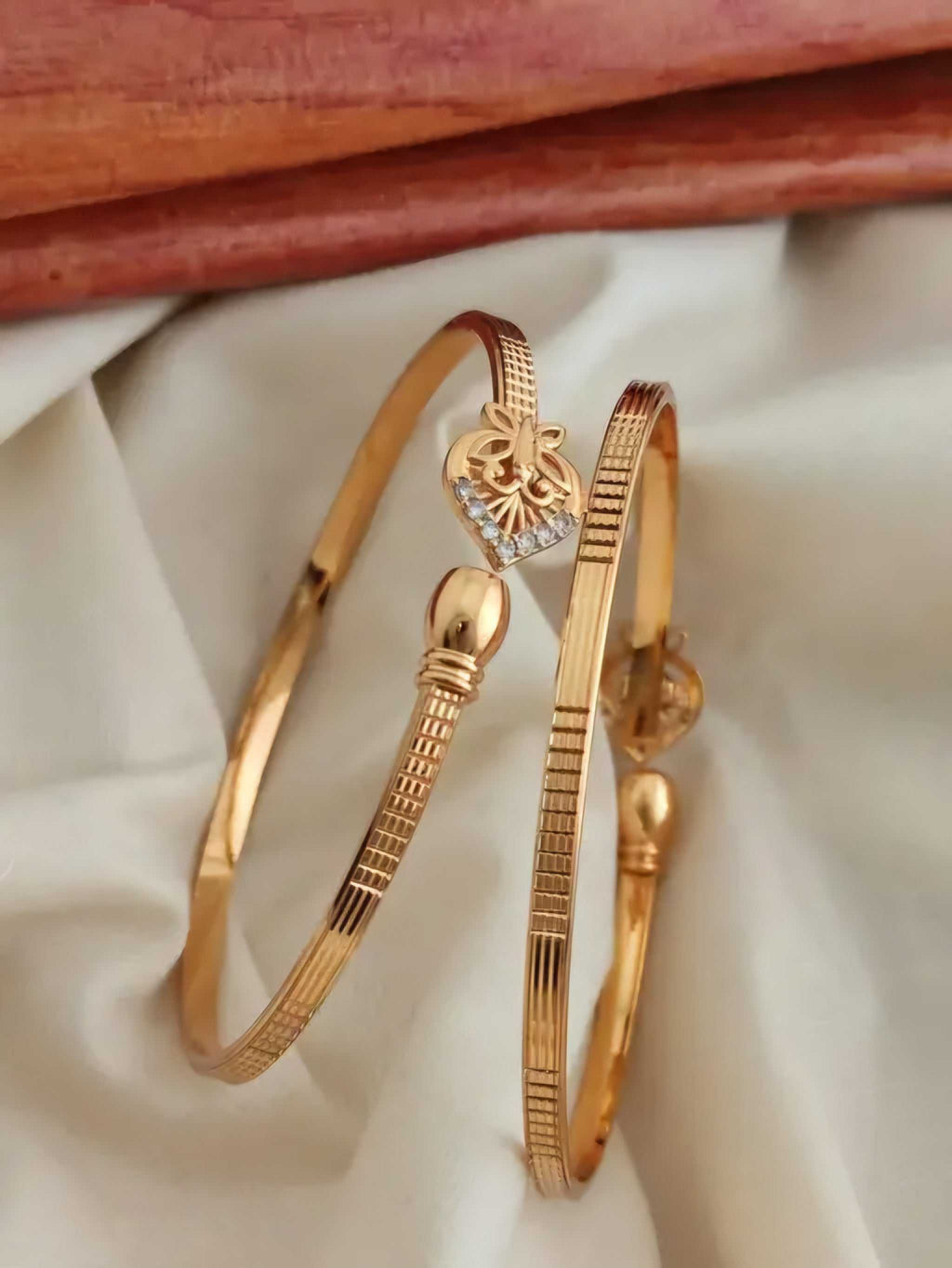 Heart-Shaped Gold Bangles with Diamond Accents – Romantic & Modern Look